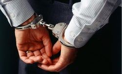 Man in handcuffs.